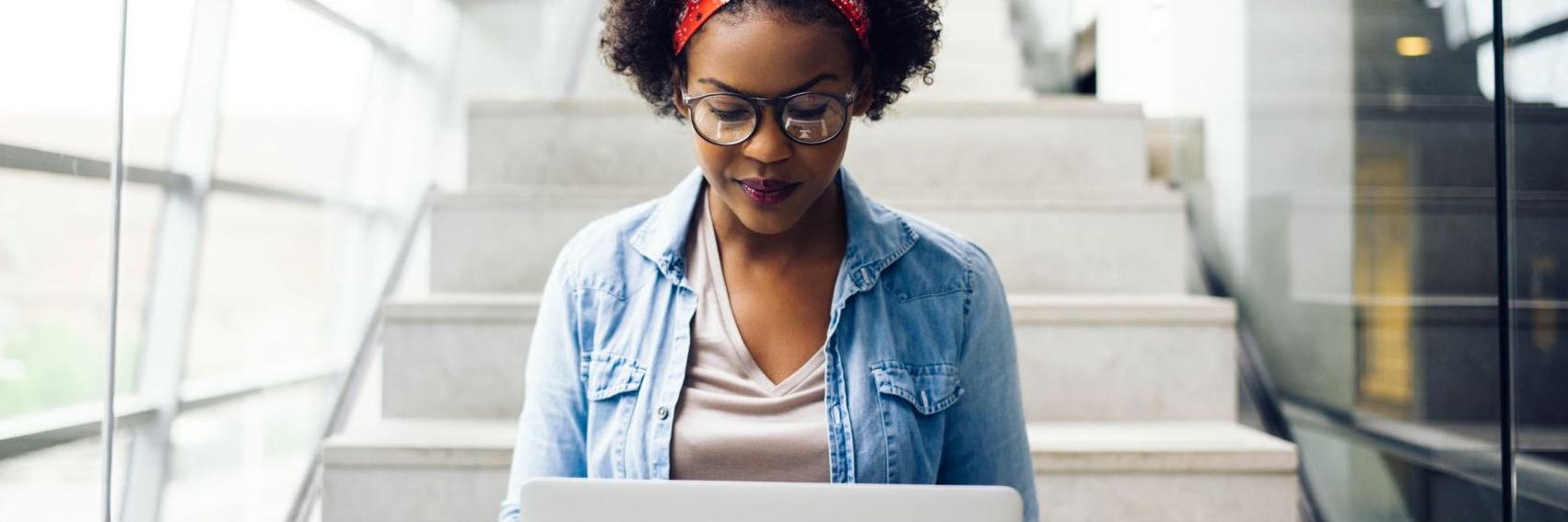 Image of young lady on computer